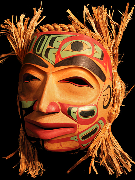 Carved Cedar mask featuring Haida Formline drawings - Reg Davidson